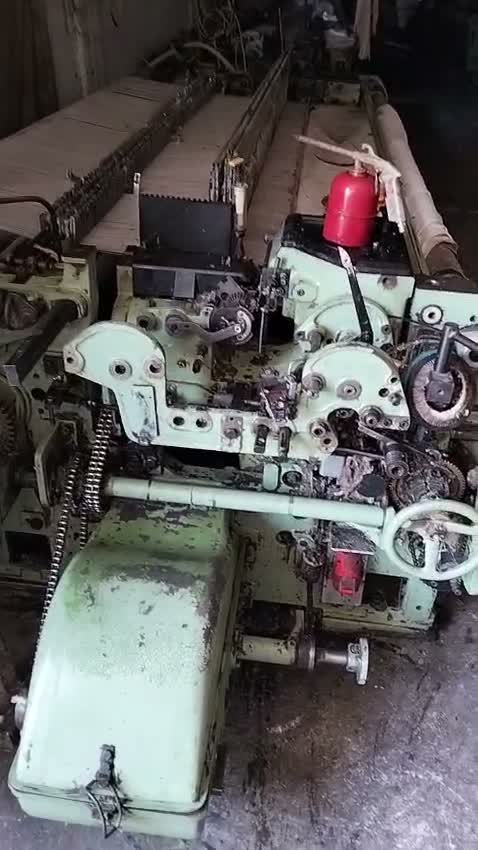 Sulzer projectile loom top view with heald frames and cam box