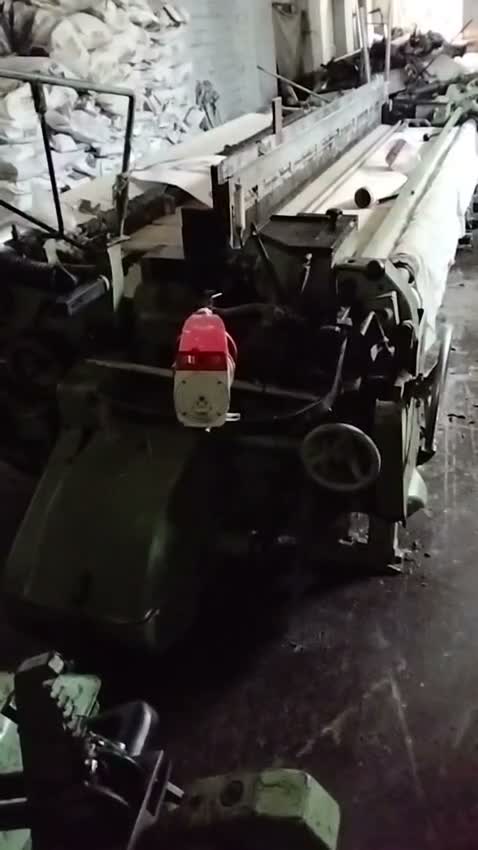Sulzer projectile weaving machine, front three-quarter view