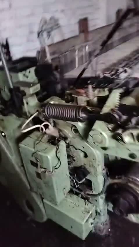 Sulzer projectile loom picking and cam mechanism, close-up